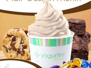 branded cup of yogurt with candy cookies and brownies 